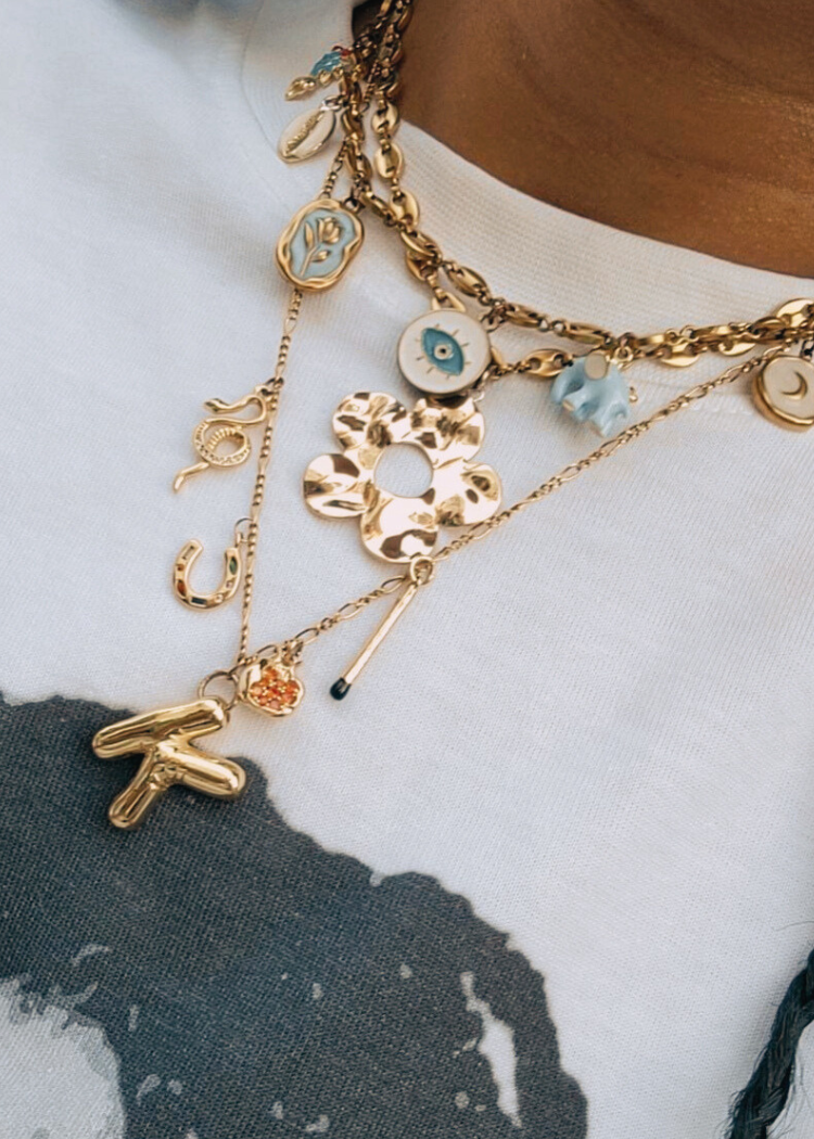 A Gilded Bond charm bar NYC pop up permanent jewelry